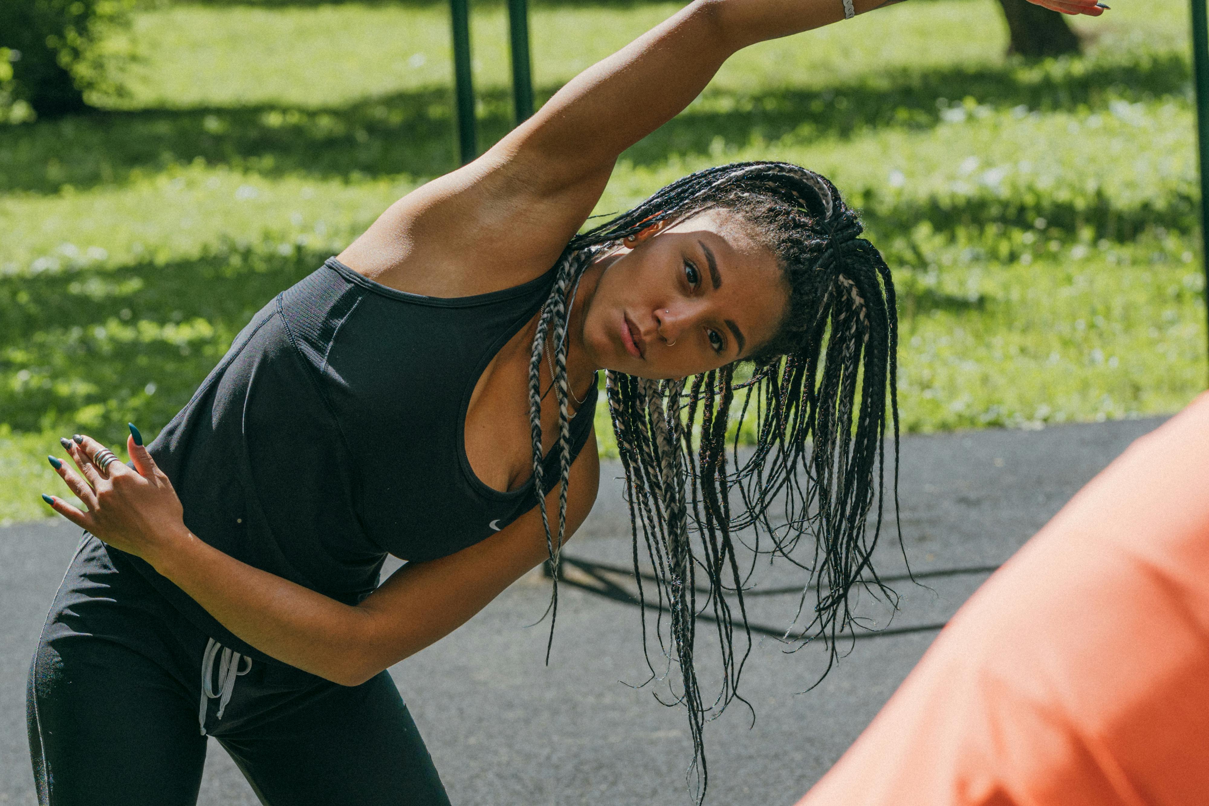 Person stretching outdoors